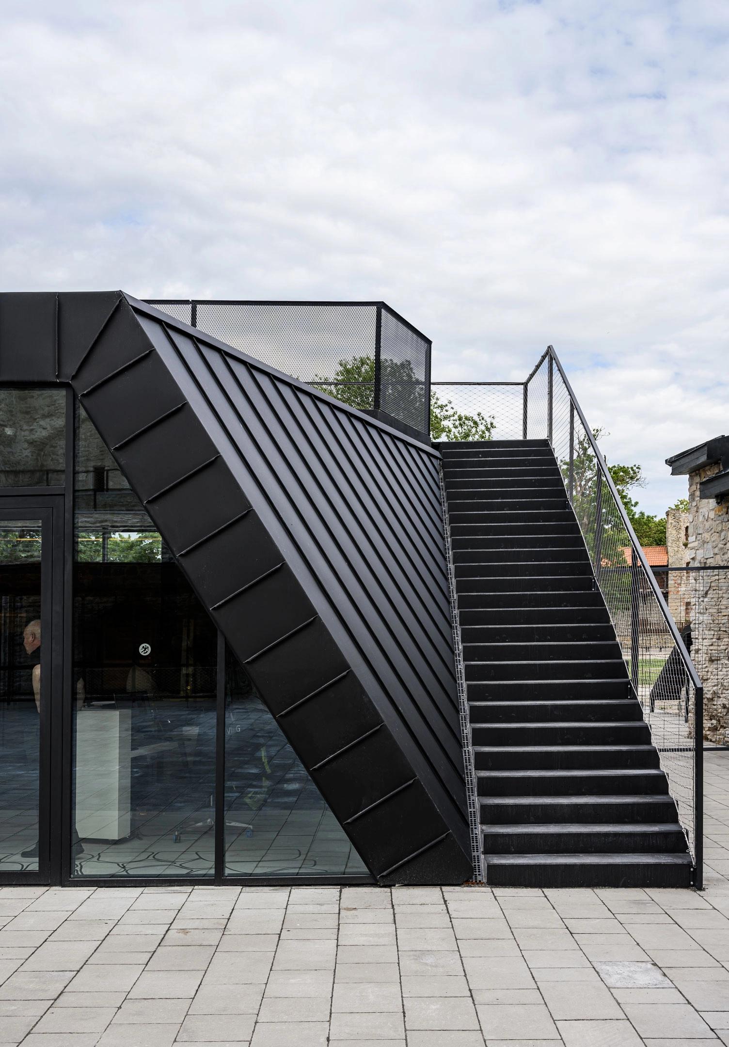 Modern black steel facade of Haapsalu castle's entrance pavilion