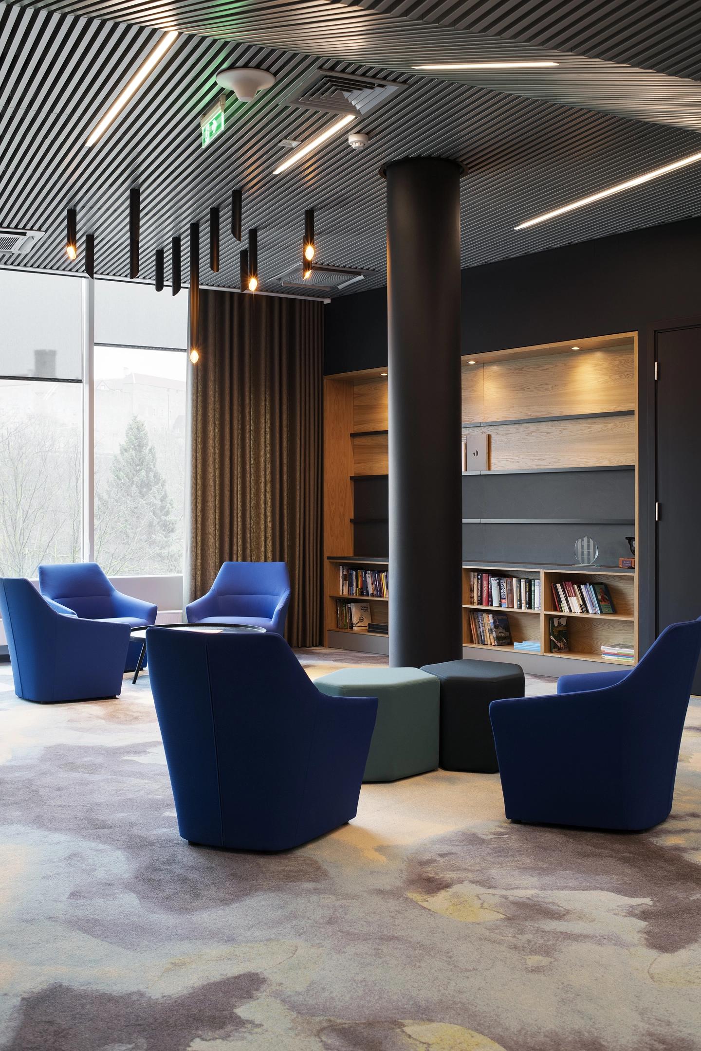 Lounge with blue textiles in Nordecon office in Tallinn